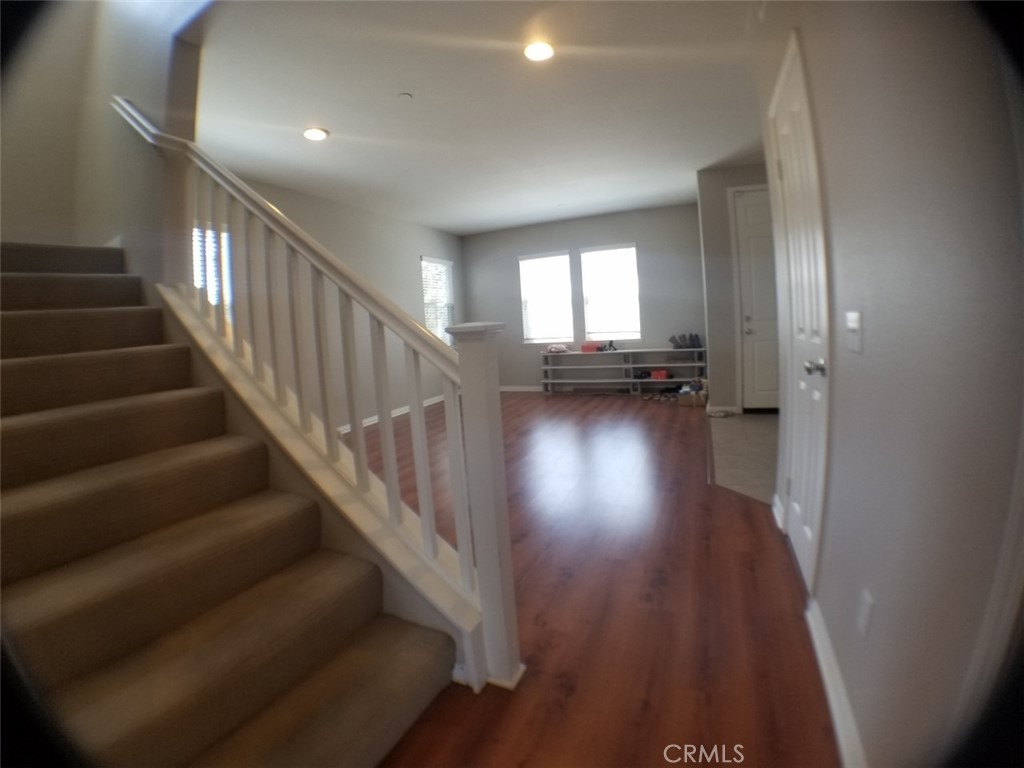 1688 Julia Way Riverside, CA 92501 - Photo 15 of 36 a view of entryway and hall with wooden floor
