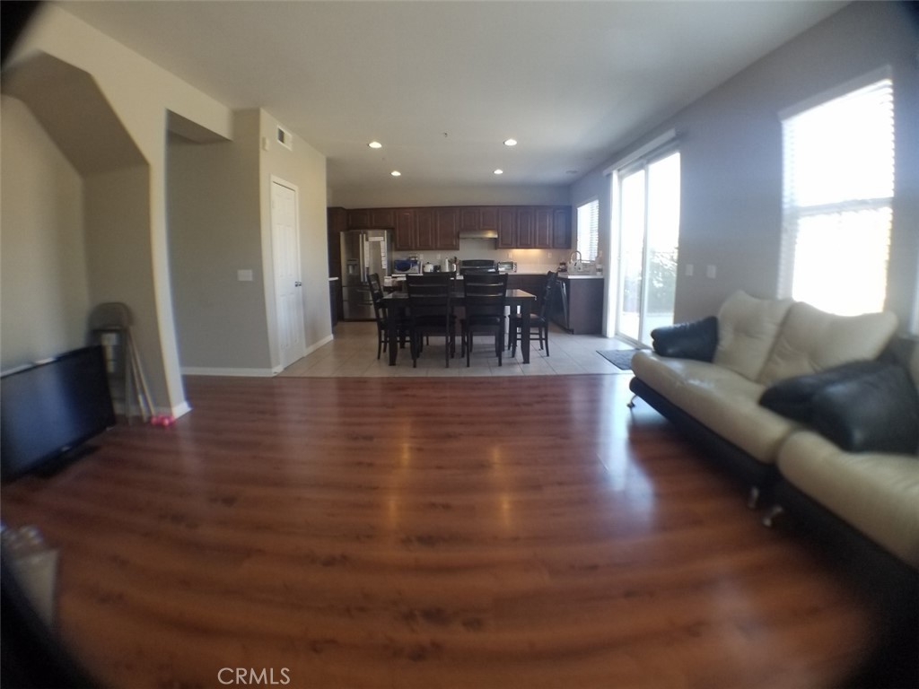 1688 Julia Way Riverside, CA 92501 - Photo 20 of 36 a living room with furniture and a large window