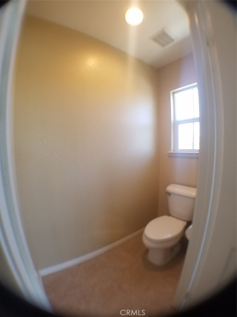 1688 Julia Way Riverside, CA 92501 - Photo 4 of 36 a bathroom with a toilet