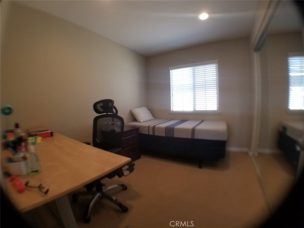 1688 Julia Way Riverside, CA 92501 - Photo 9 of 36 a living room with furniture and a window