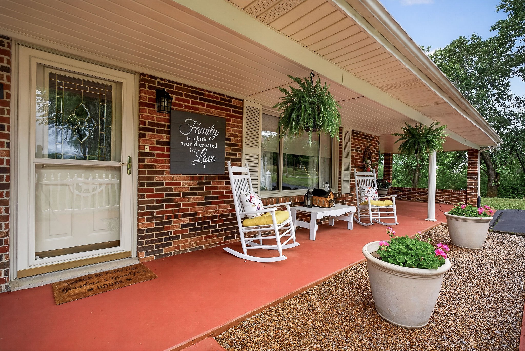 1755 Burgess Falls Road Sparta, TN 38583 - Photo 10 of 56 a view of a patio with dining table and chairs and potted plants