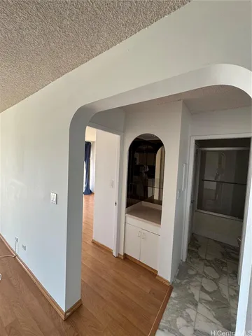 a view of entryway with bathroom