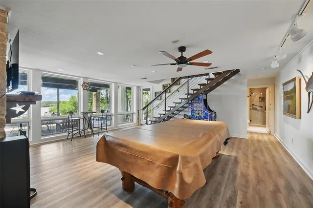 a bed room with a bed and a television