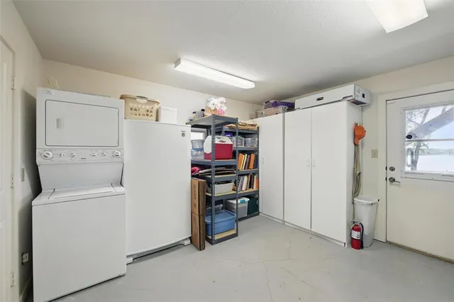 a bathroom with a granite countertop toilet sink and a mirror