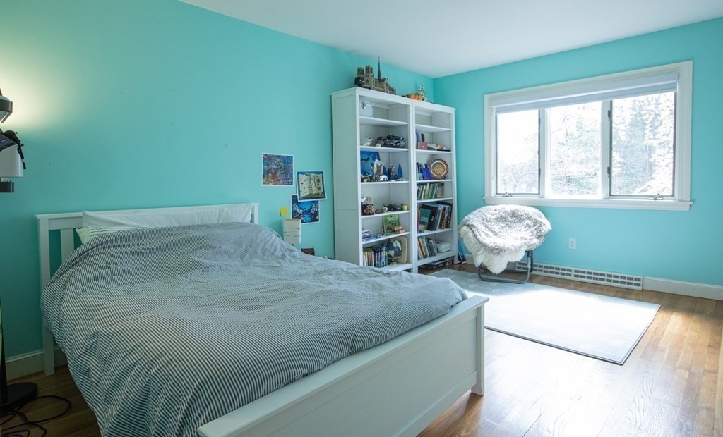 48 Amherst Road Belmont, MA 02478 - Photo 13 of 26 a living room with furniture and a large window