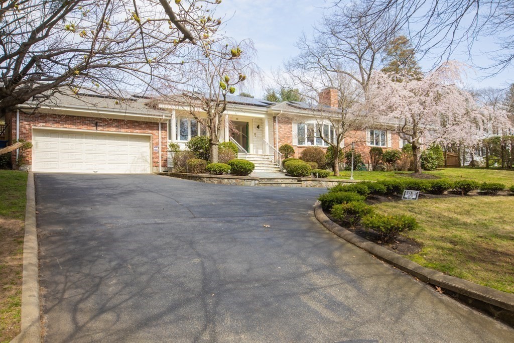 48 Amherst Road Belmont, MA 02478 - Photo 21 of 26 a view of a house with backyard and sitting area