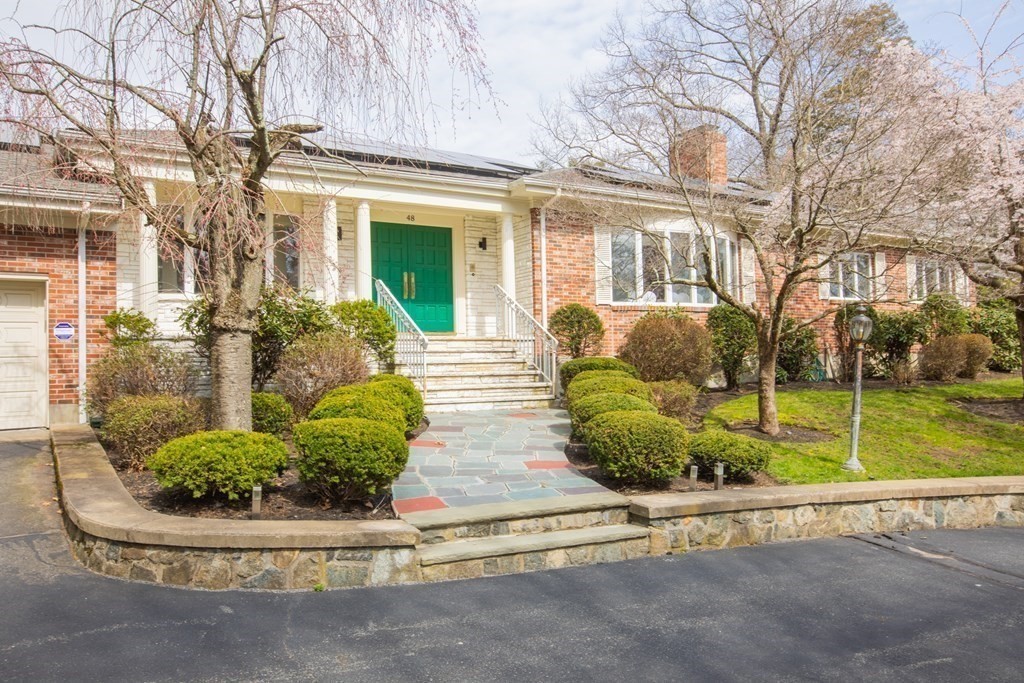48 Amherst Road Belmont, MA 02478 - Photo 22 of 26 a front view of a house with garden