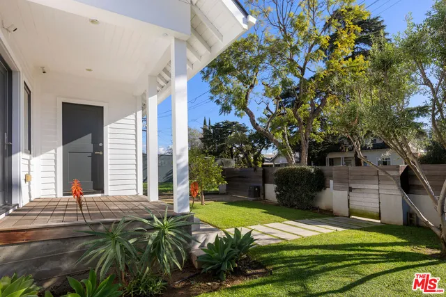a view of a backyard with a garden