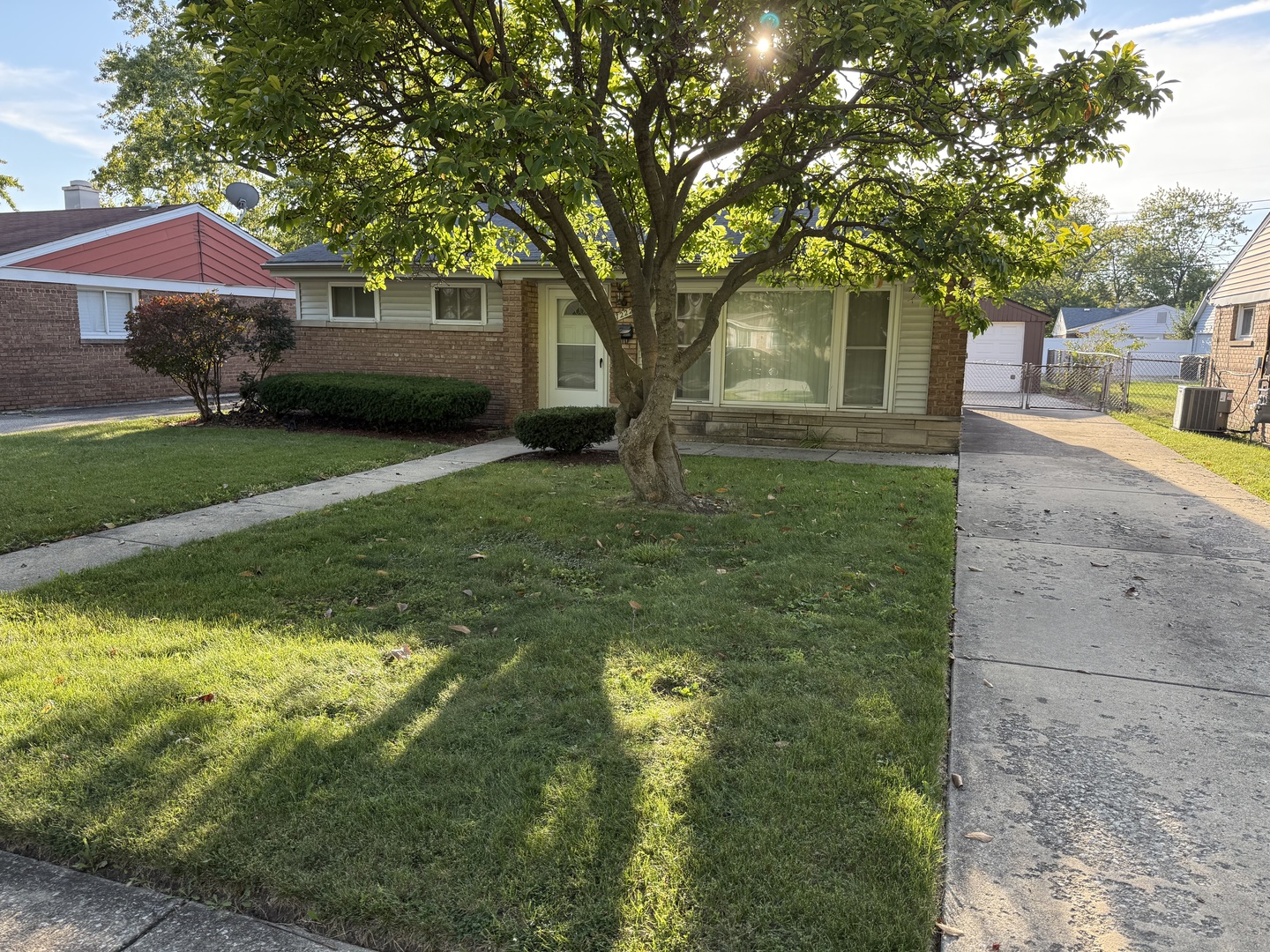 17222 Roy Street Lansing, IL 60438 - Photo 1 of 1 a front view of a house with garden