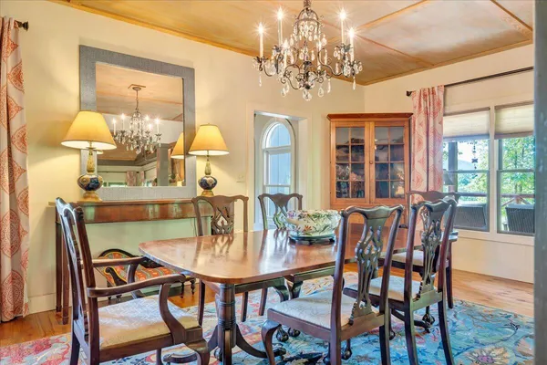 a view of a patio with a table and chairs