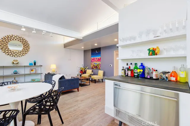 a view of a dining room with furniture and toys