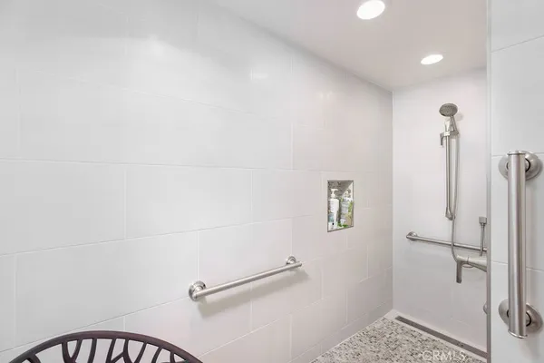 a bedroom with a bed and a table