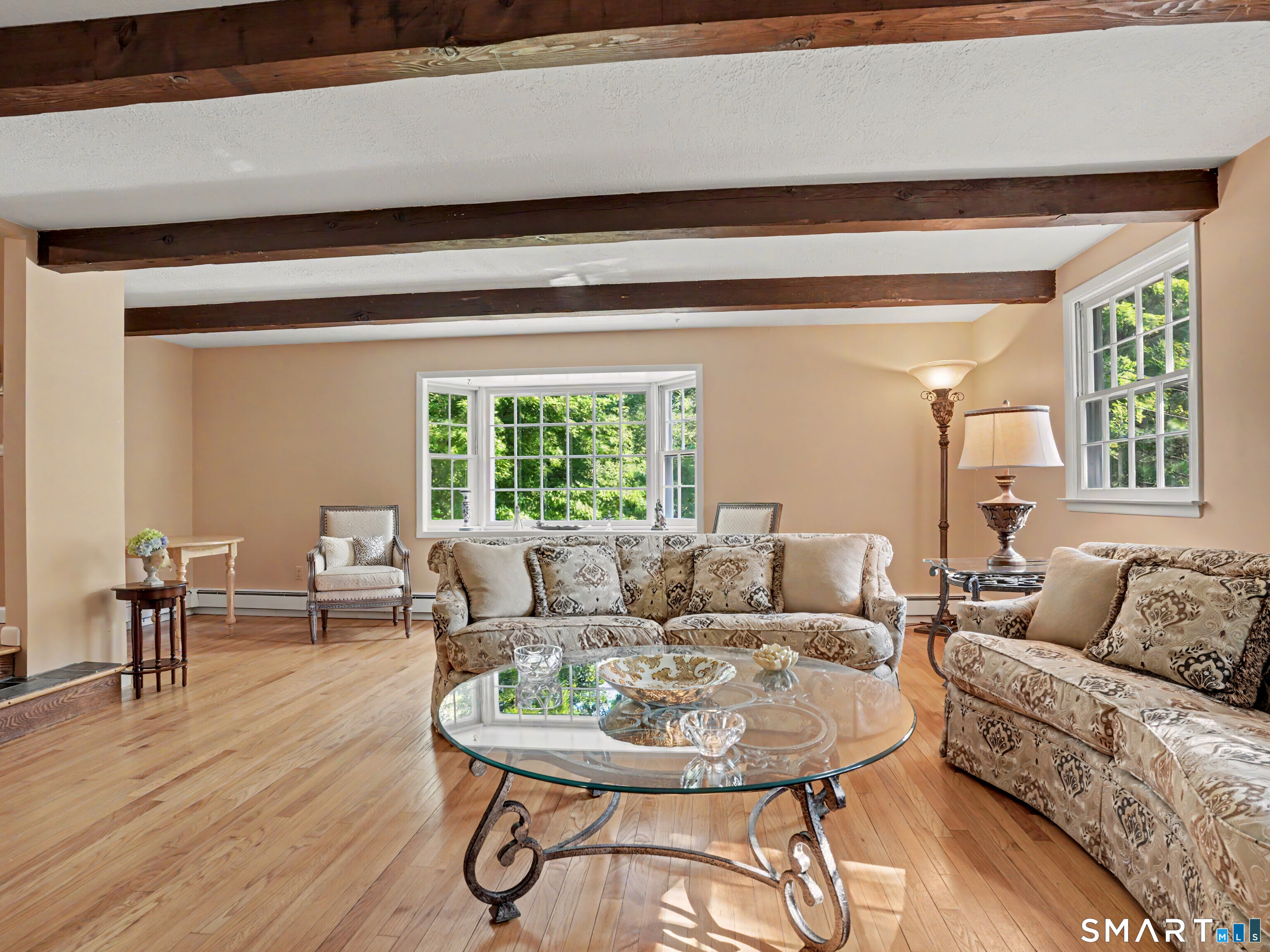 15 Flat Rock Drive Ridgefield, CT 06877 - Photo 8 of 39 a living room with furniture and a large window