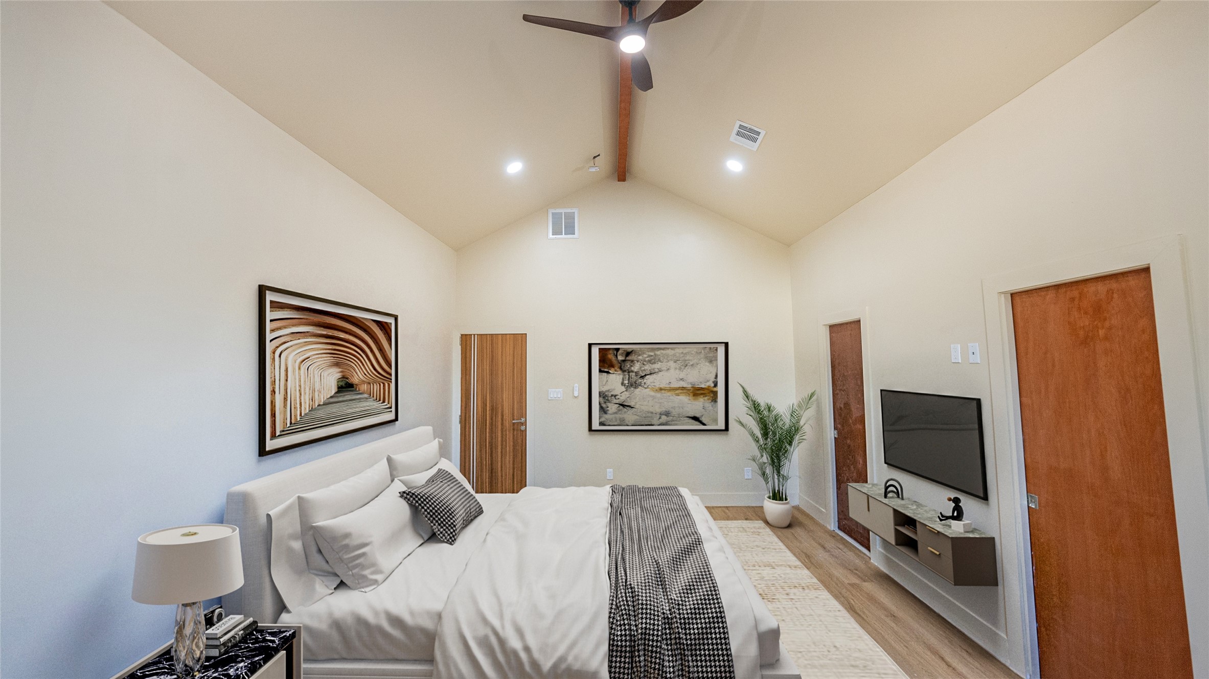 0 Noah Street Houston, TX 77021 - Photo 11 of 15 a bedroom with a bed and a flat screen tv