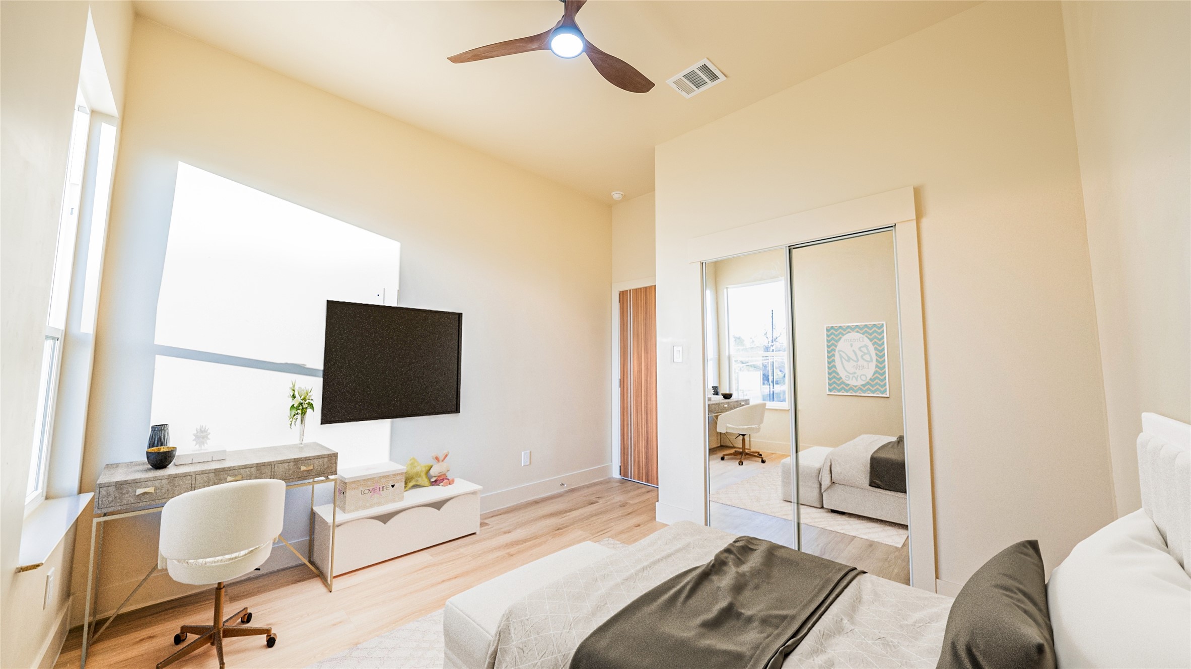 0 Noah Street Houston, TX 77021 - Photo 14 of 15 a bedroom with a bed and a flat screen tv