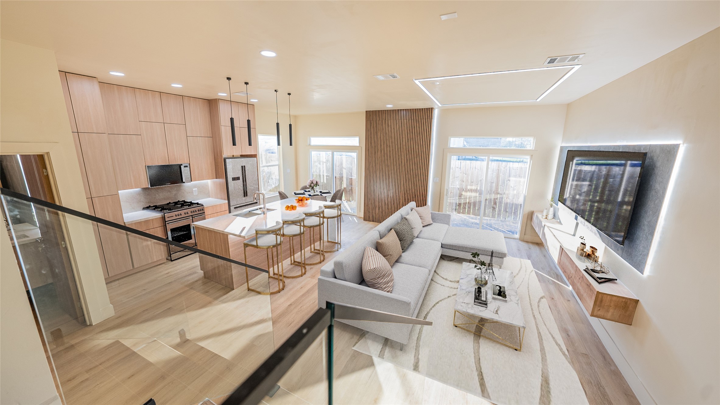 0 Noah Street Houston, TX 77021 - Photo 4 of 15 a living room with furniture a flat screen tv and a table