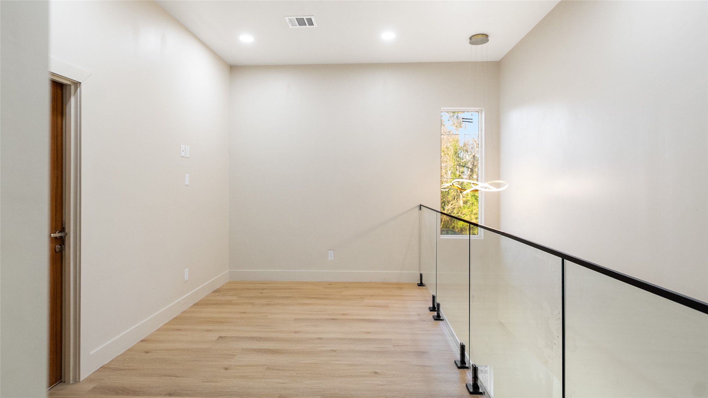 0 Noah Street Houston, TX 77021 - Photo 10 of 15 a view of entryway with wooden floor
