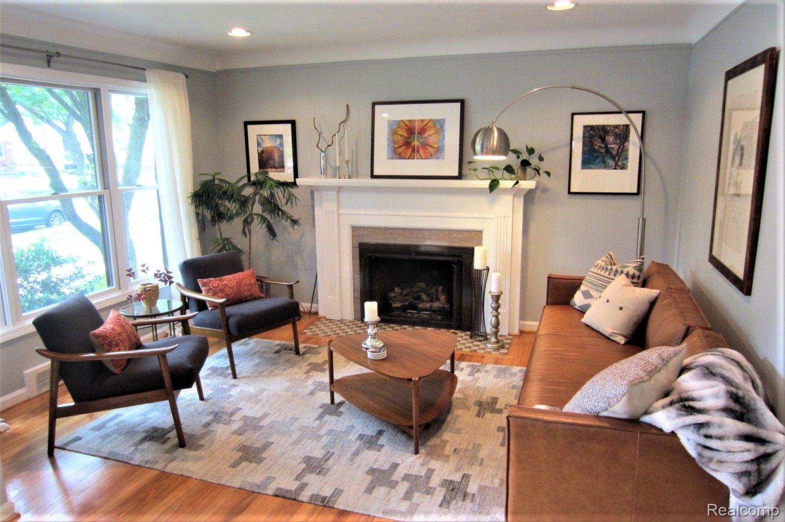 2737 Manchester Road Birmingham, MI 48009 - Photo 2 of 42 Living Room w/ gas fp, huge window spaces & charm!