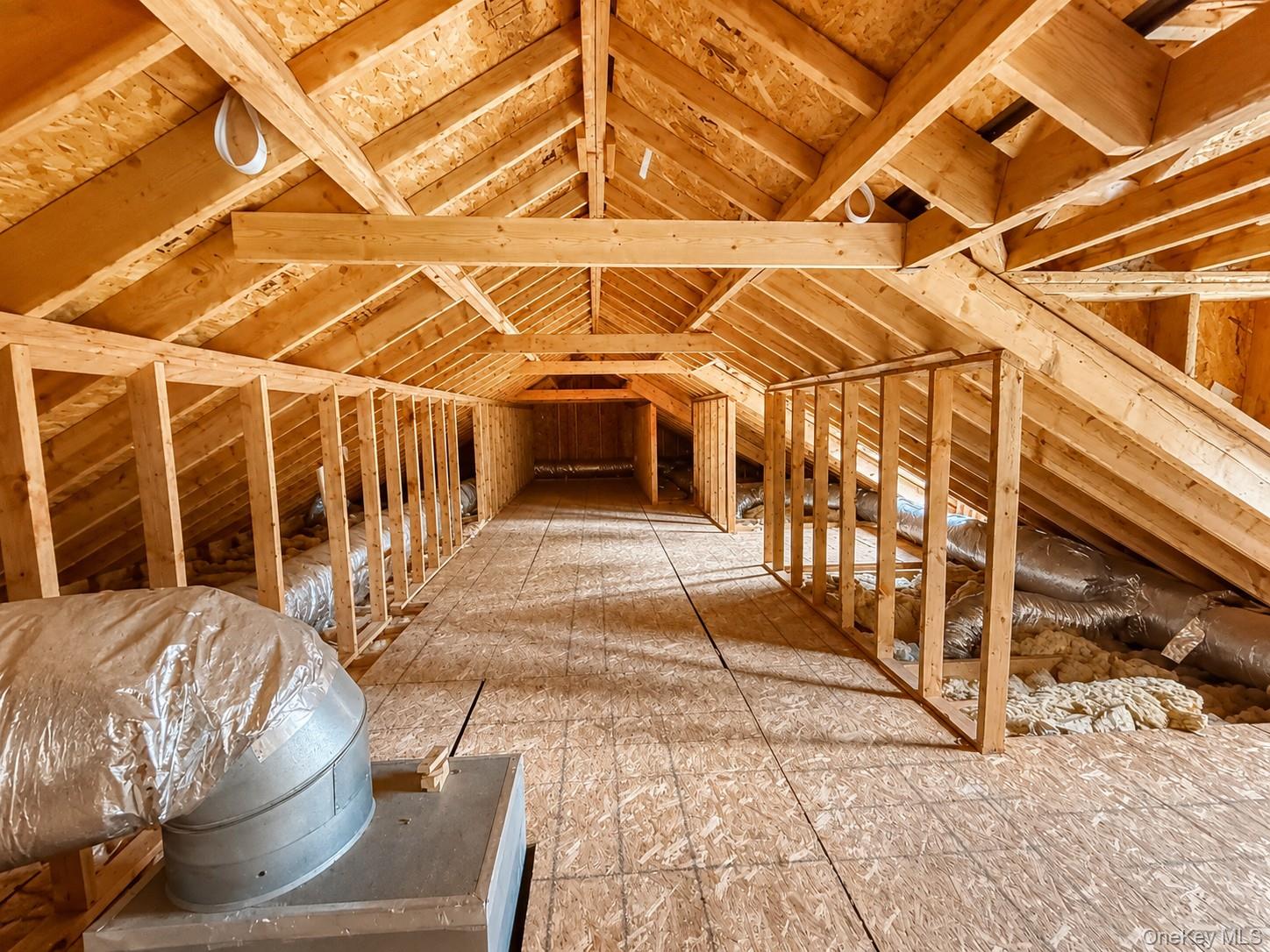411 Mt Joy Road Middletown, NY 10941 - Photo 42 of 49 Framed attic space featuring exposed wood rafter system, subflooring, and existing ductwork