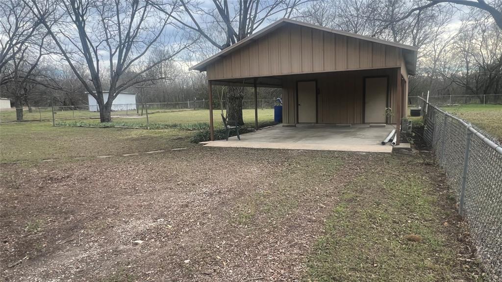 3725 Colina Lane Waco, TX 76705 - Photo 14 of 30 a view of a house with a yard and tree