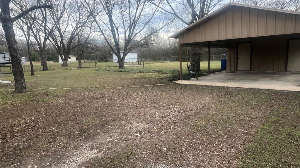 3725 Colina Lane Waco, TX 76705 - Photo 15 of 30 a view of a house with a yard