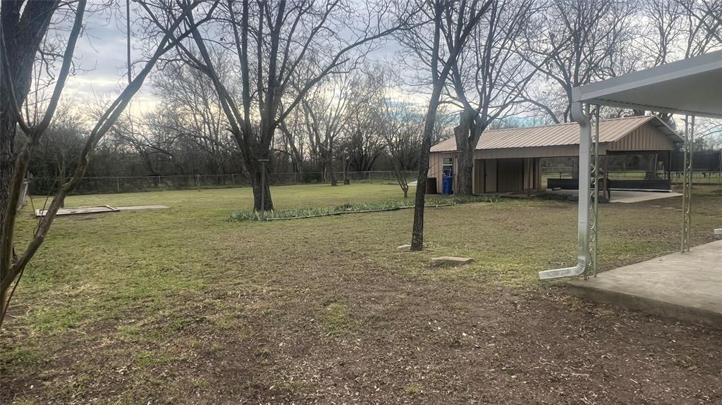 3725 Colina Lane Waco, TX 76705 - Photo 17 of 30 a backyard of a house with lots of green space