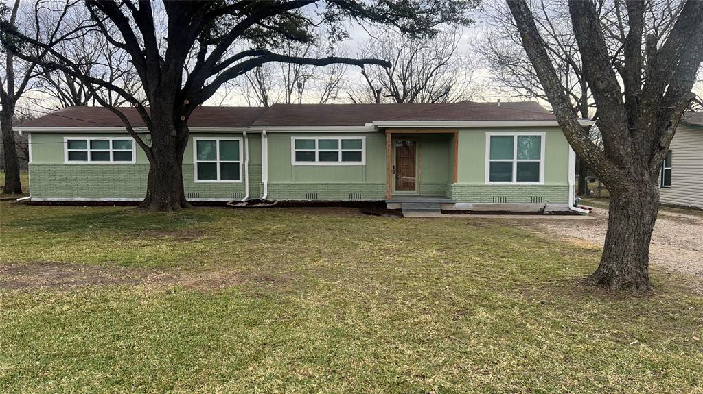 3725 Colina Lane Waco, TX 76705 - Photo 2 of 11 front view of a house with a yard