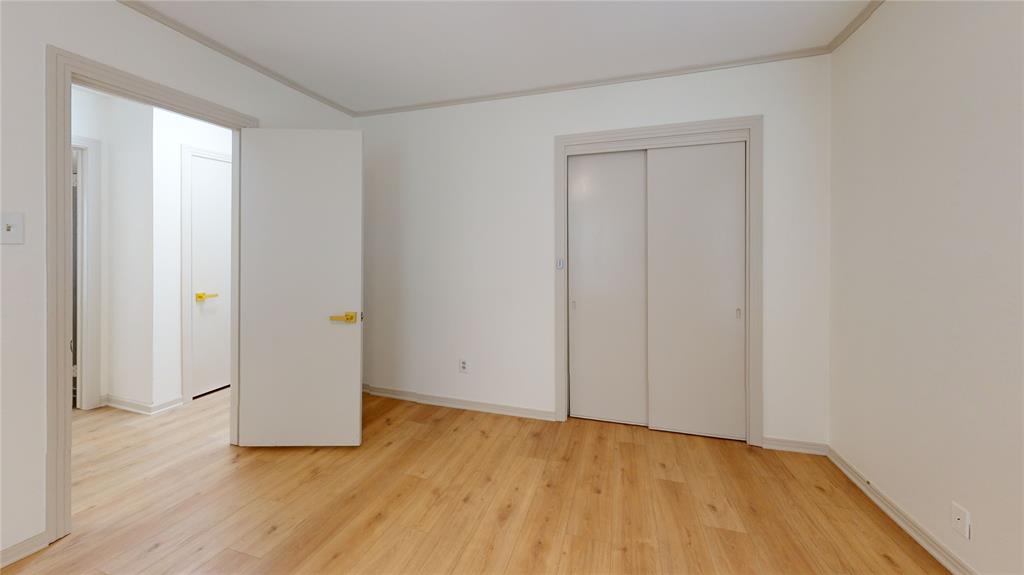 3725 Colina Lane Waco, TX 76705 - Photo 22 of 30 a view of an empty room and wooden floor