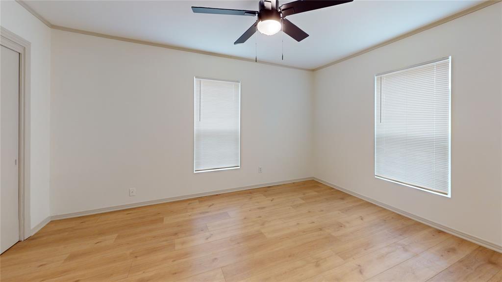 3725 Colina Lane Waco, TX 76705 - Photo 24 of 30 an empty room with a window and a fan