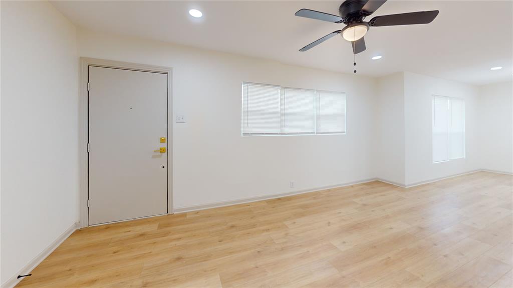 3725 Colina Lane Waco, TX 76705 - Photo 8 of 11 an empty room with a window and a fan