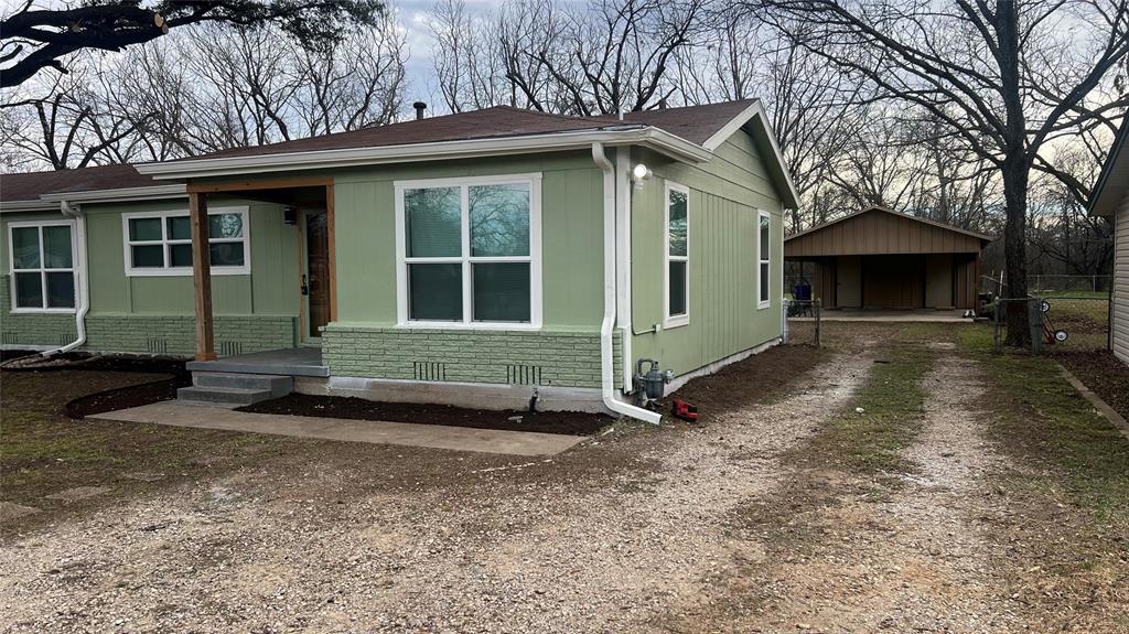 3725 Colina Lane Waco, TX 76705 - Photo 10 of 30 a front view of a house with garden