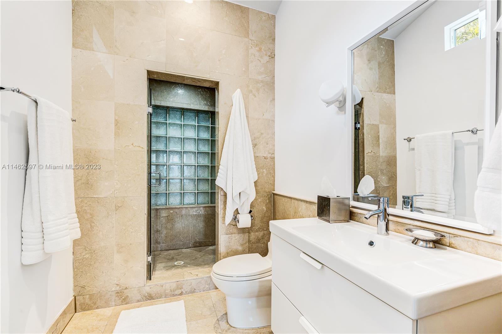 32 Southwest 23rd Road Miami, FL 33129 - Photo 18 of 34 a bathroom with a sink toilet and shower