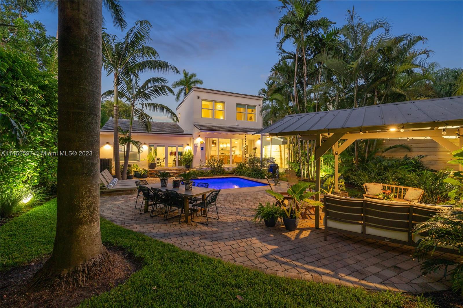 32 Southwest 23rd Road Miami, FL 33129 - Photo 28 of 34 an outdoor sitting area with couch and chairs