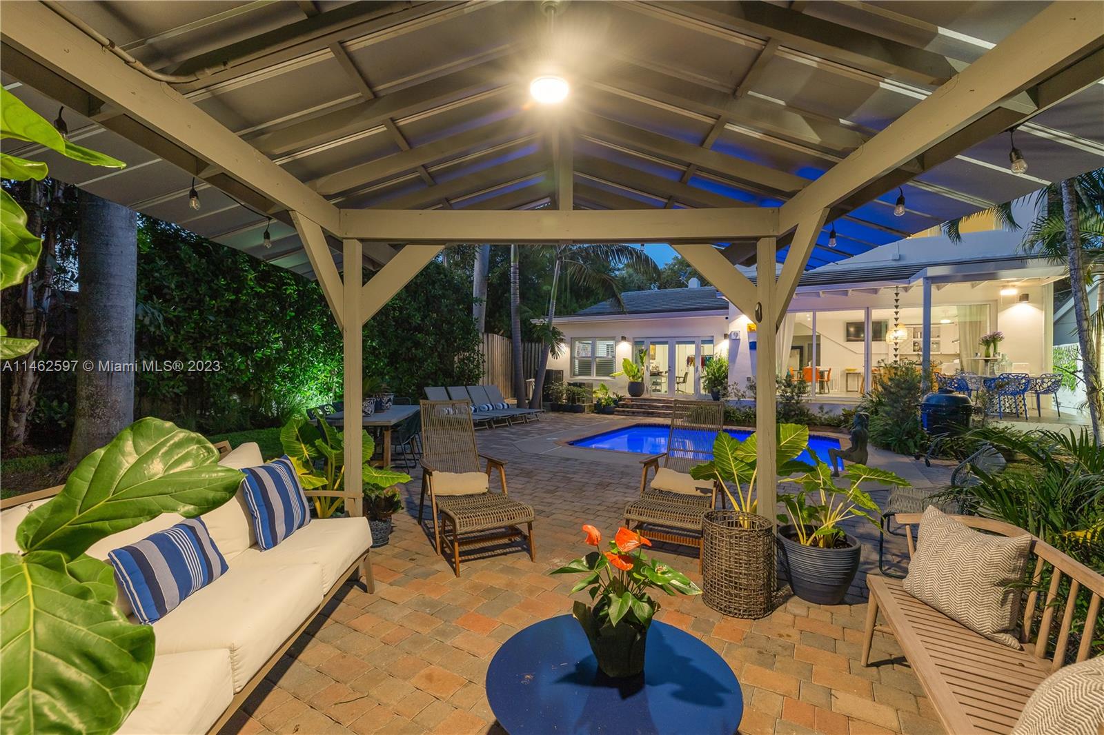 32 Southwest 23rd Road Miami, FL 33129 - Photo 31 of 34 a outdoor living space with furniture and garden view