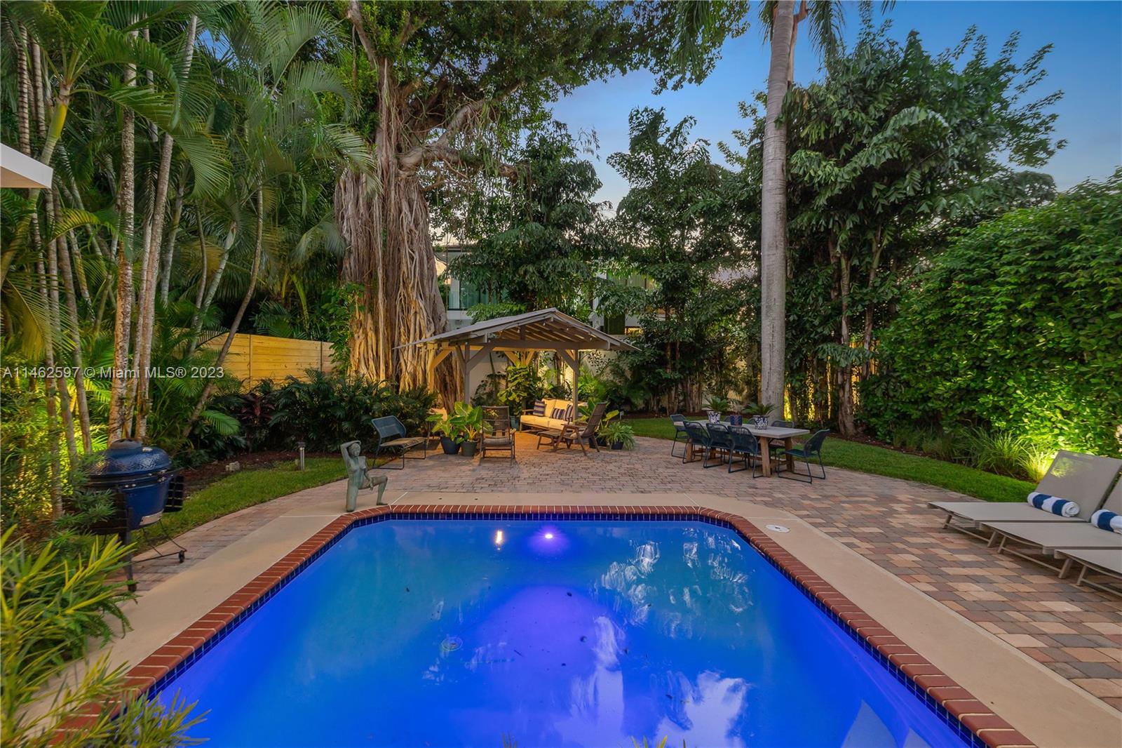 32 Southwest 23rd Road Miami, FL 33129 - Photo 32 of 34 a view of a backyard with swimming pool