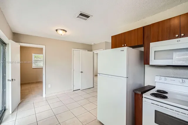 $437,000 | 2440 Northwest 208th Street, Miami Gardens, FL 33056