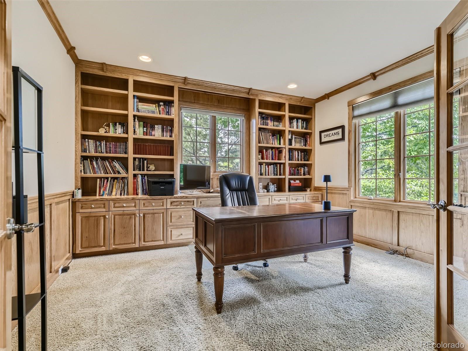 992 West Ridge Road Littleton, CO 80120 - Photo 13 of 44 a view of a workspace with furniture and a window