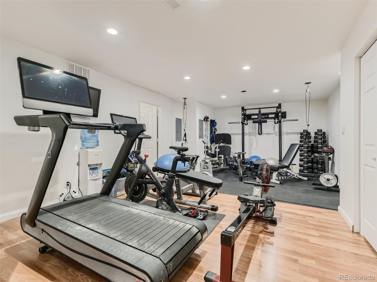 992 West Ridge Road Littleton, CO 80120 - Photo 24 of 44 a view of a room with gym equipment