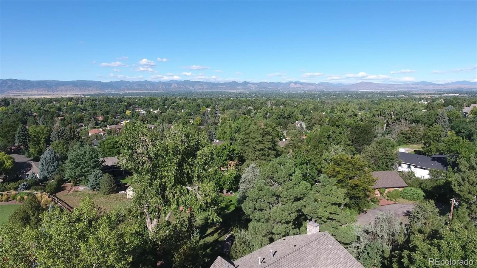 992 West Ridge Road Littleton, CO 80120 - Photo 44 of 44 a view of a city with lush green forest