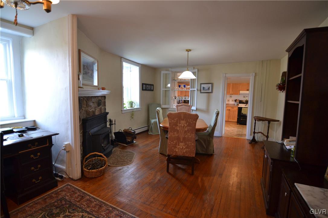 810 North Summit Road Bath, PA 18014 - Photo 33 of 50 a view of a dining room with furniture a chandelier and wooden floor