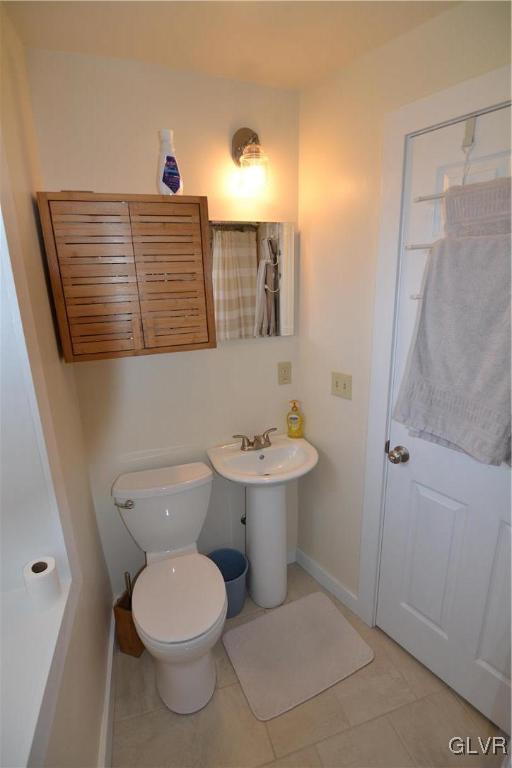 810 North Summit Road Bath, PA 18014 - Photo 46 of 50 a bathroom with a toilet a sink and mirror