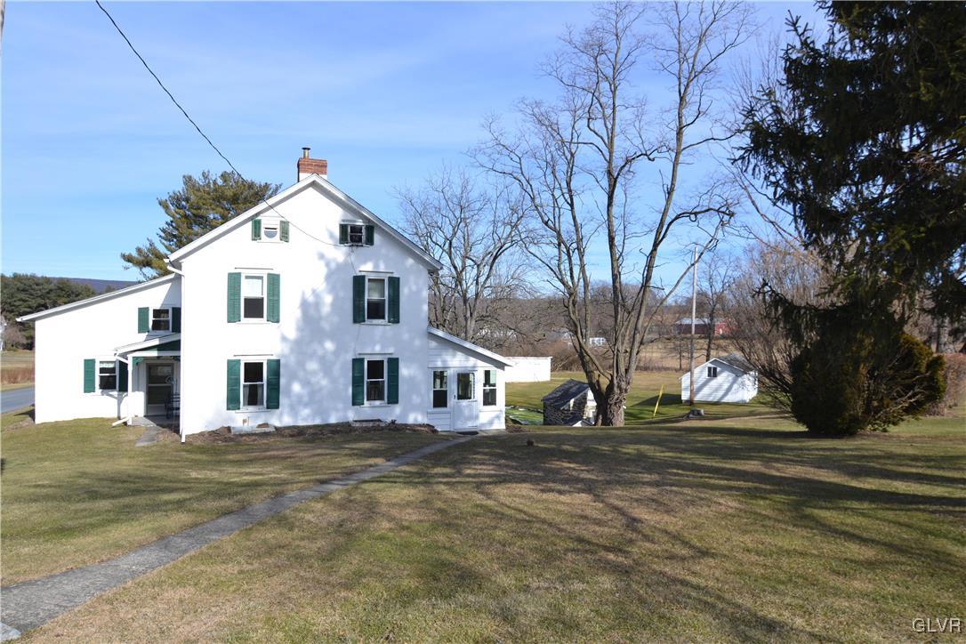 810 North Summit Road Bath, PA 18014 - Photo 6 of 50 a view of a white house with a large tree