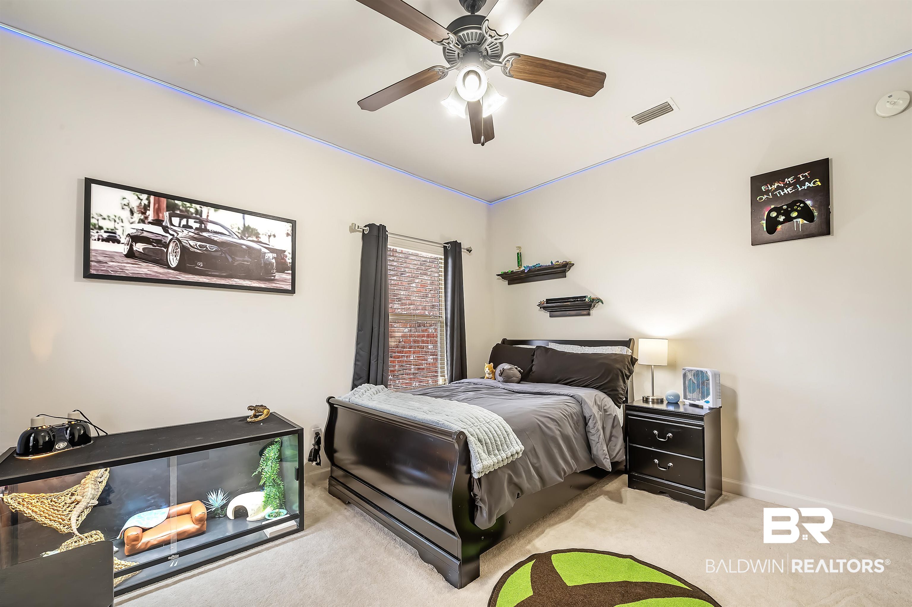 9376 Sable Court Daphne, AL 36526 - Photo 33 of 46 Bedroom with light colored carpet and ceiling fan