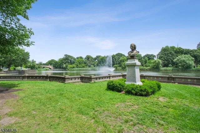 a view of a lake with a yard
