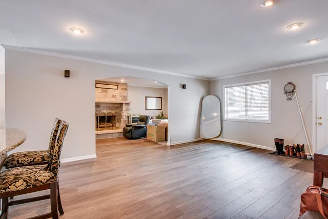 a view of a livingroom with furniture and a window