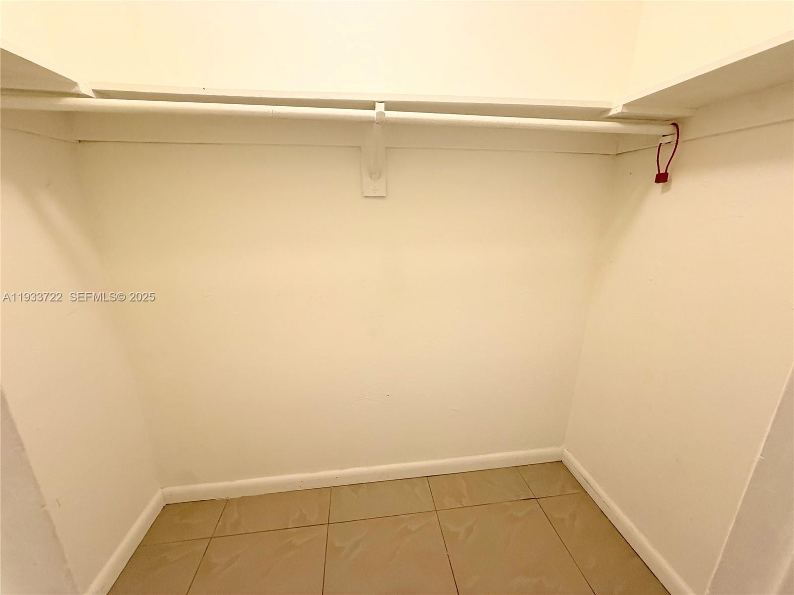 2950 Griffin Road, Unit 3 Dania Beach, FL 33312 - Photo 7 of 13 a view of a room with racks on the wall