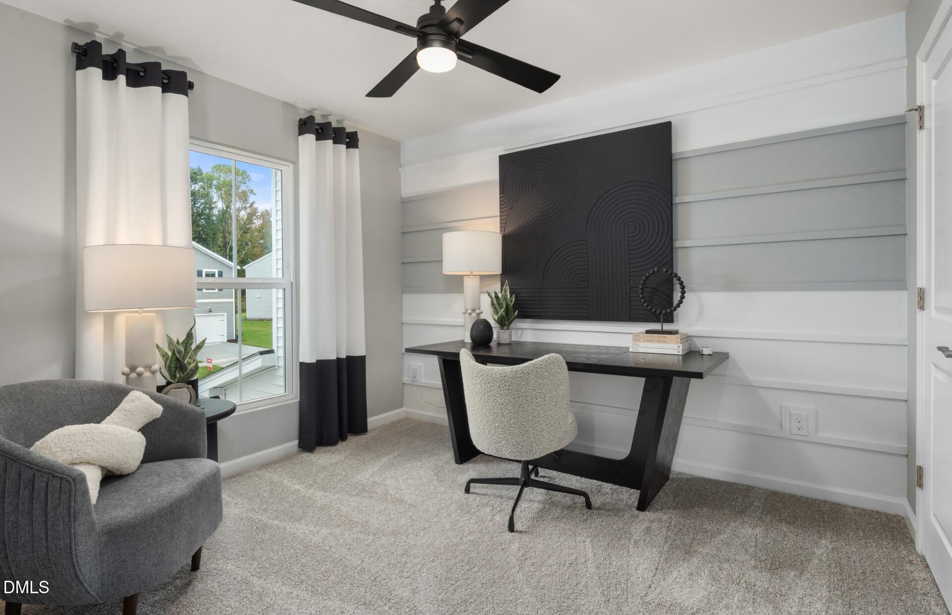 3015 Hammer Creek Road Durham, NC 27704 - Photo 15 of 18 a view of a livingroom with furniture and a window