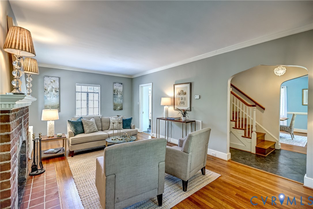 4814 Riverside Drive Richmond, VA 23225 - Photo 10 of 39 a living room with furniture and a wooden floor