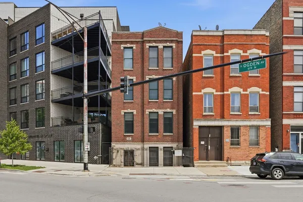 a view of a building on a street