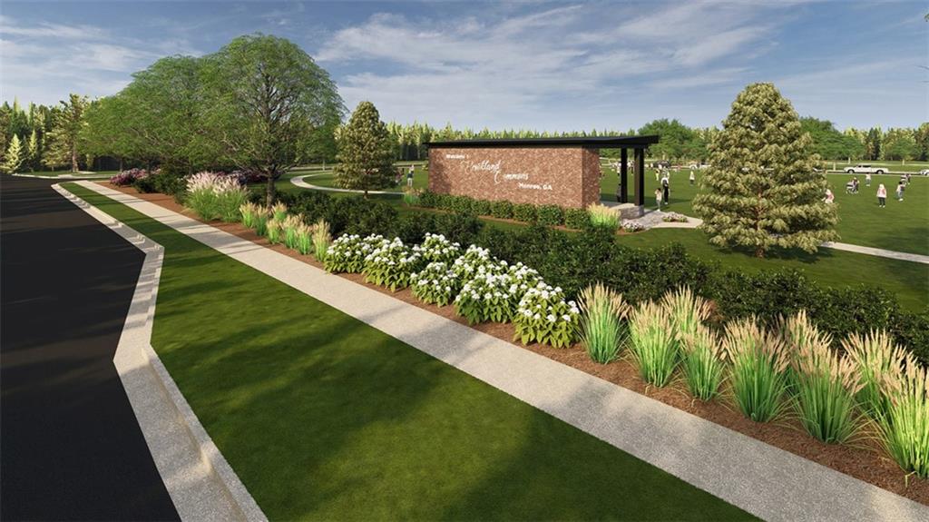 319 Tate Street Monroe, GA 30655 - Photo 3 of 9 a view of a lake from a balcony